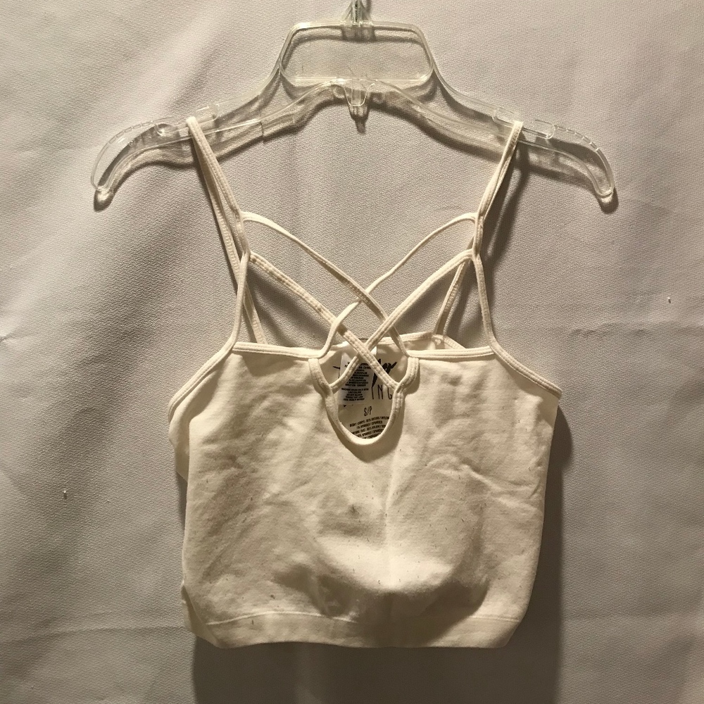 white crop top with criss cross neckline